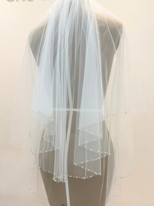 Velo perlitas y pedrería