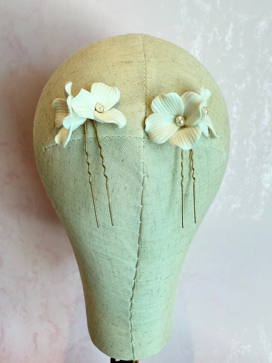 Pines de Porcelana Dorados C210